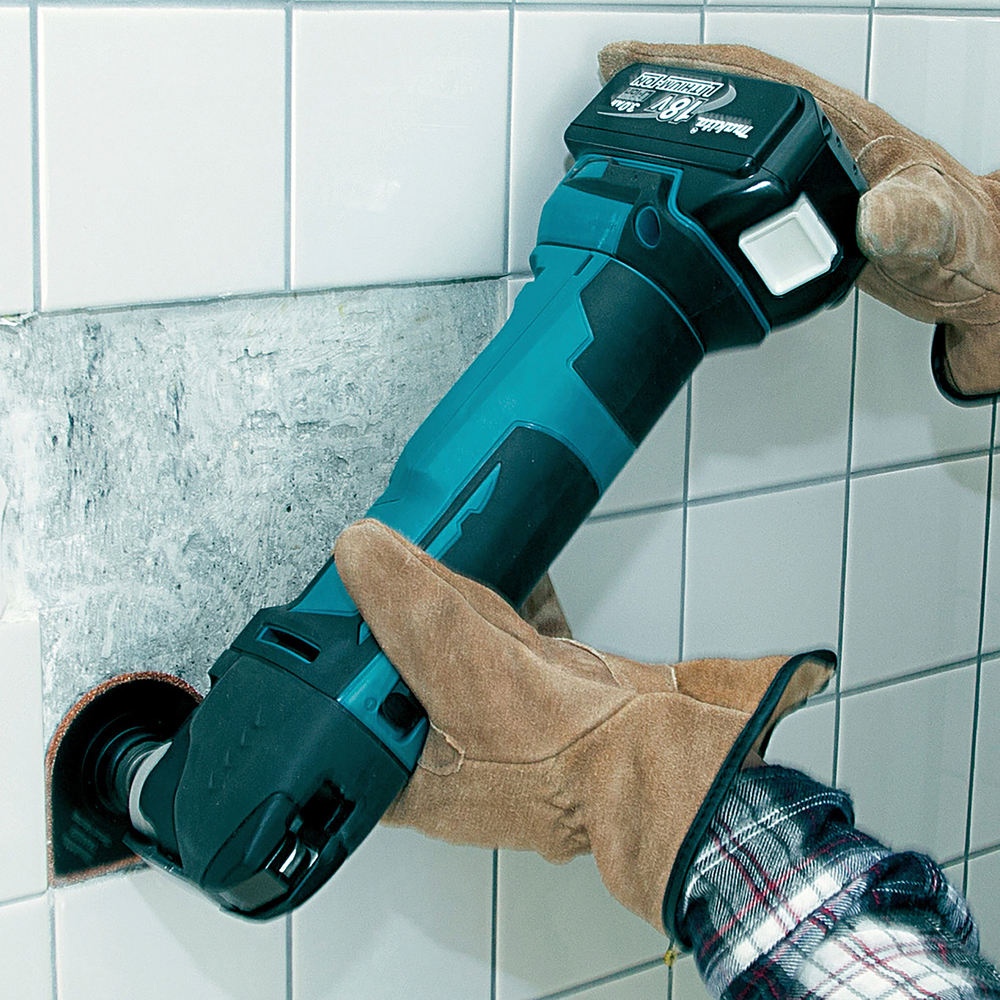 Аккумуляторный многофункциональный инструмент Makita DTM51Z 18В, 6000-20000 об\мин, без акб и ЗУ