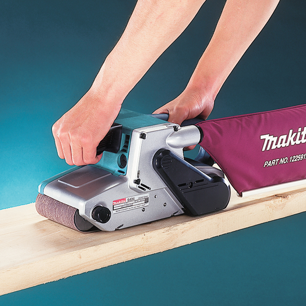 Ленточная шлифовальная машина электрическая  Makita 9404 1010 Вт, 100х610 мм, 210-440 м/мин