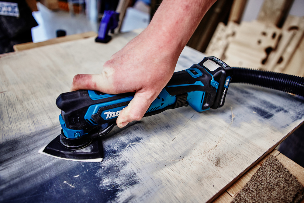 Аккумуляторный многофункциональный инструмент Makita TM30DZ 10.8В, 6000-20000 об\мин, без акб и ЗУ