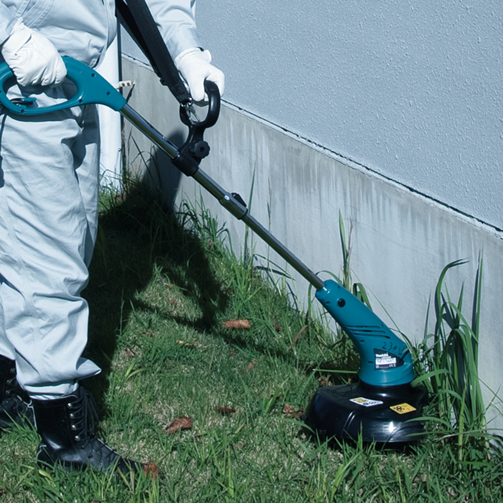 Триммер электрический Makita UR3000 450 Вт, 30 см, леска-1х1.65 мм