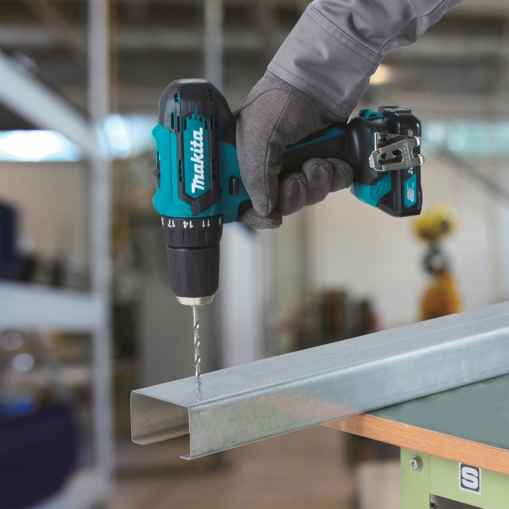 Ударная дрель-шуруповерт аккумуляторная Makita HP333DZ CXT 12В, 30 Нм, 1700 об/мин, без акб и ЗУ